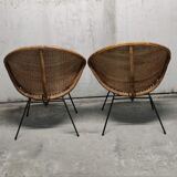 Pair of braided rattan armchairs
