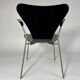 Arn Jocobsen black lacquered wooden armrest chair in the year 50