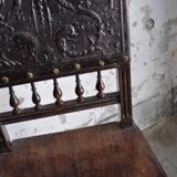 Pair of antique wooden and brown leather dining chairs, brass studs.