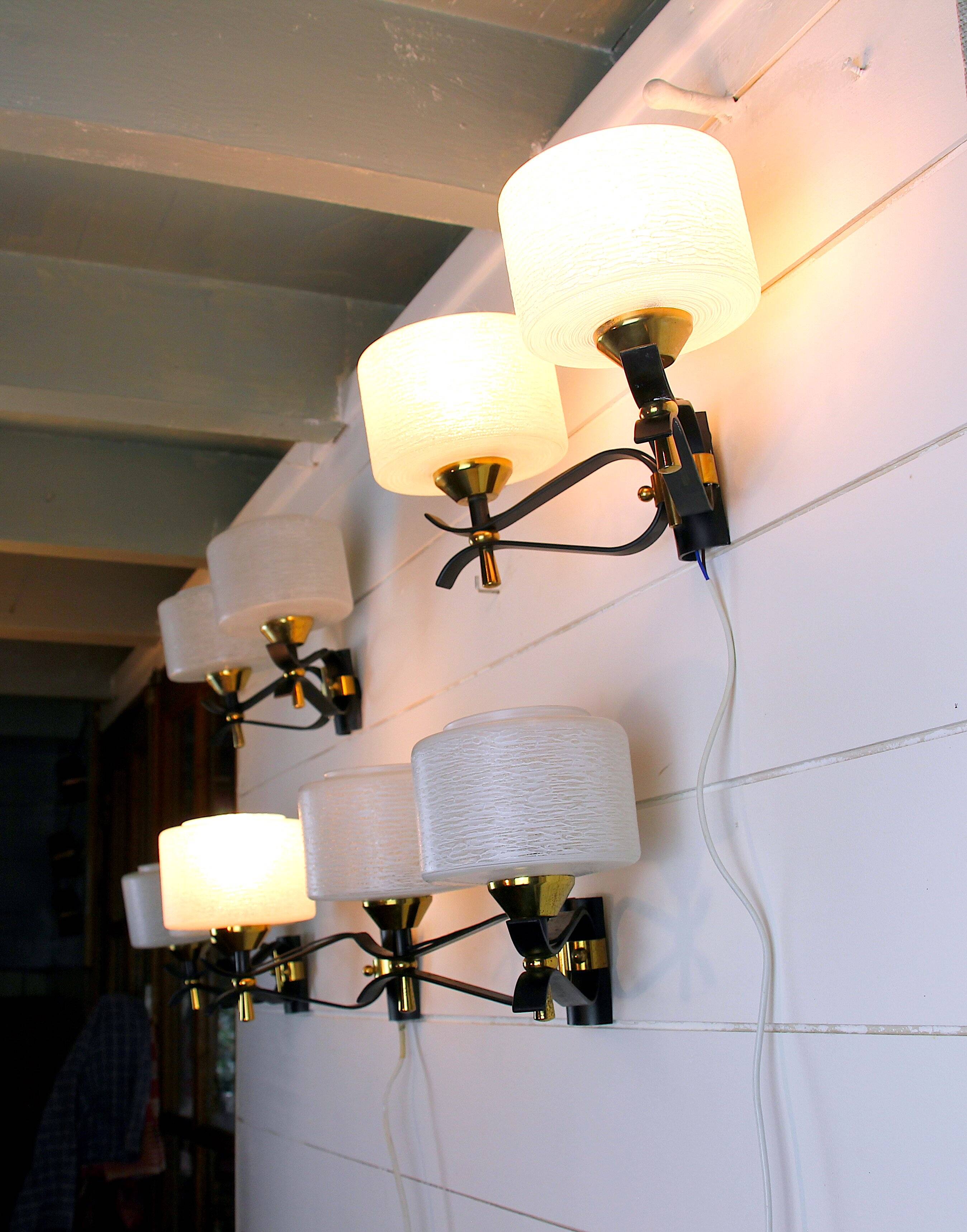 Pair of double wall sconces, Maison Arlus, Mid-Century, black brass opaline