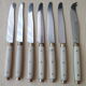 Set of 6 cheese knives and 1 Vintage Bakelite serving knives