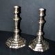 Pair of antique octagonal candlesticks in silvered bronze, Regency style.
