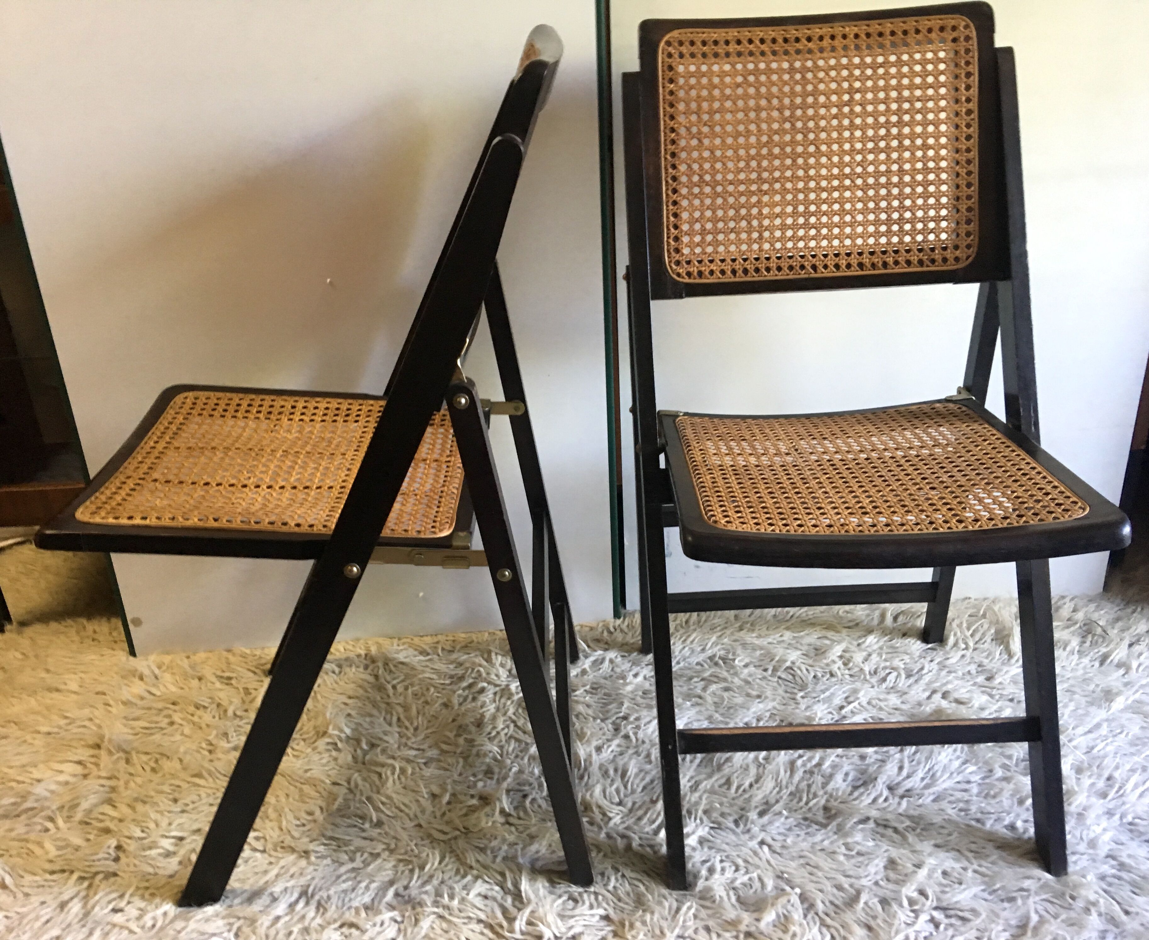 Four folding wooden and canning chairs - 70s