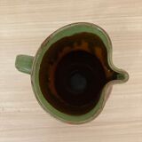 Green and brown ceramic pitcher