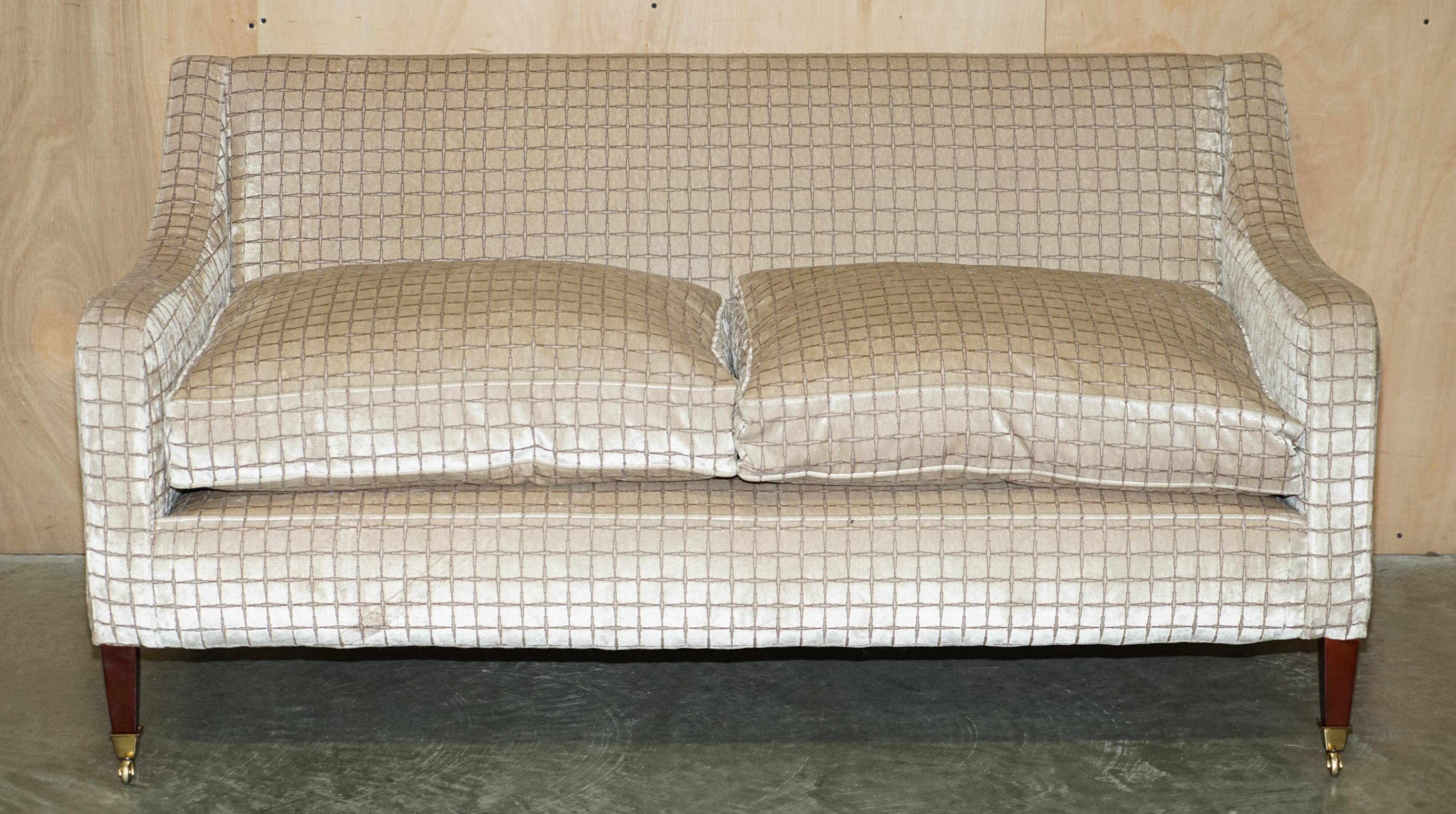 Fabric sofa and footstool, handmade in England.