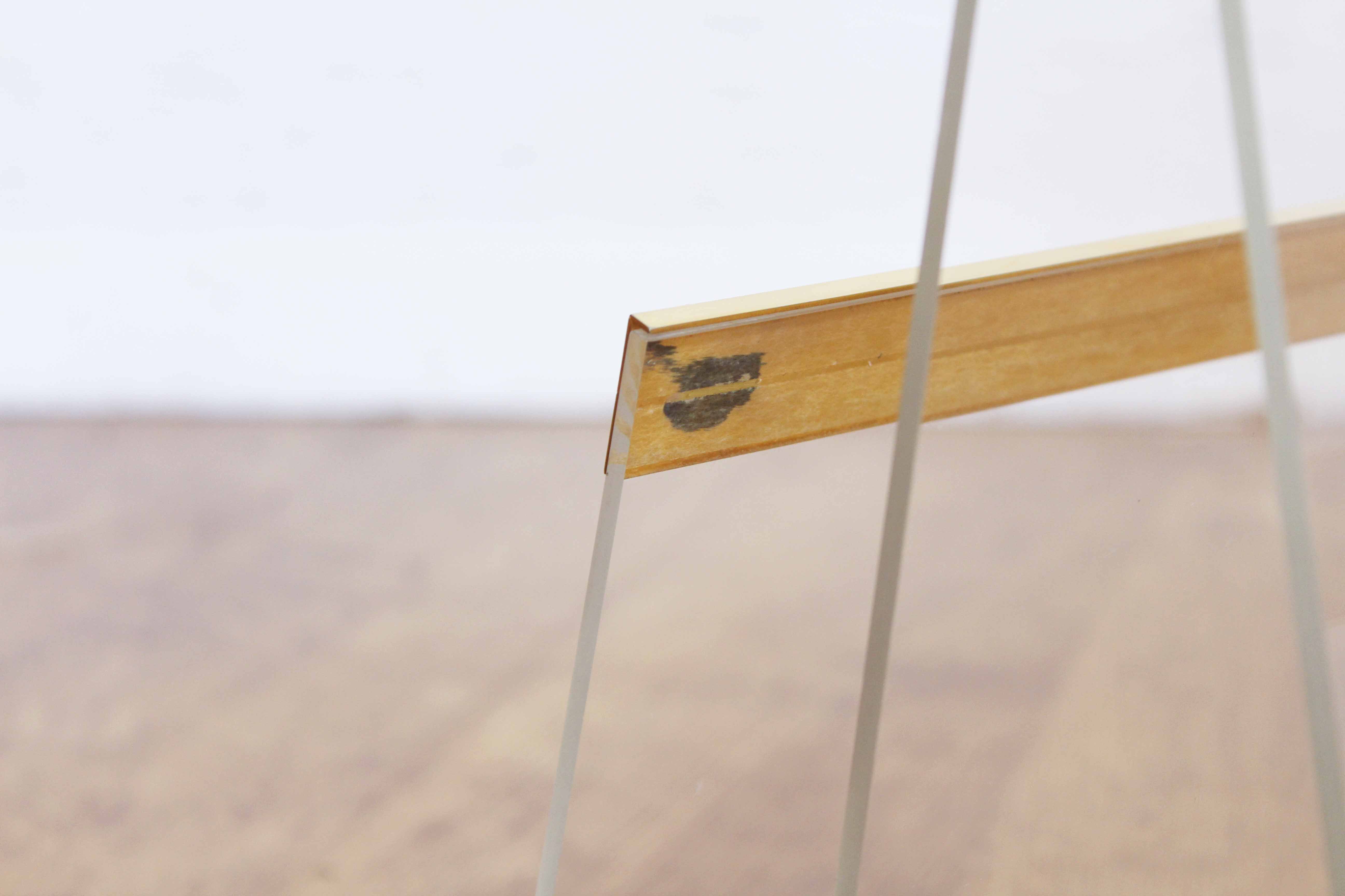 Plexiglas and brass magazine holder