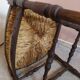 Wooden armchair with straw seat