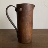 Mountain pitcher in monoxile wood and leather folk art