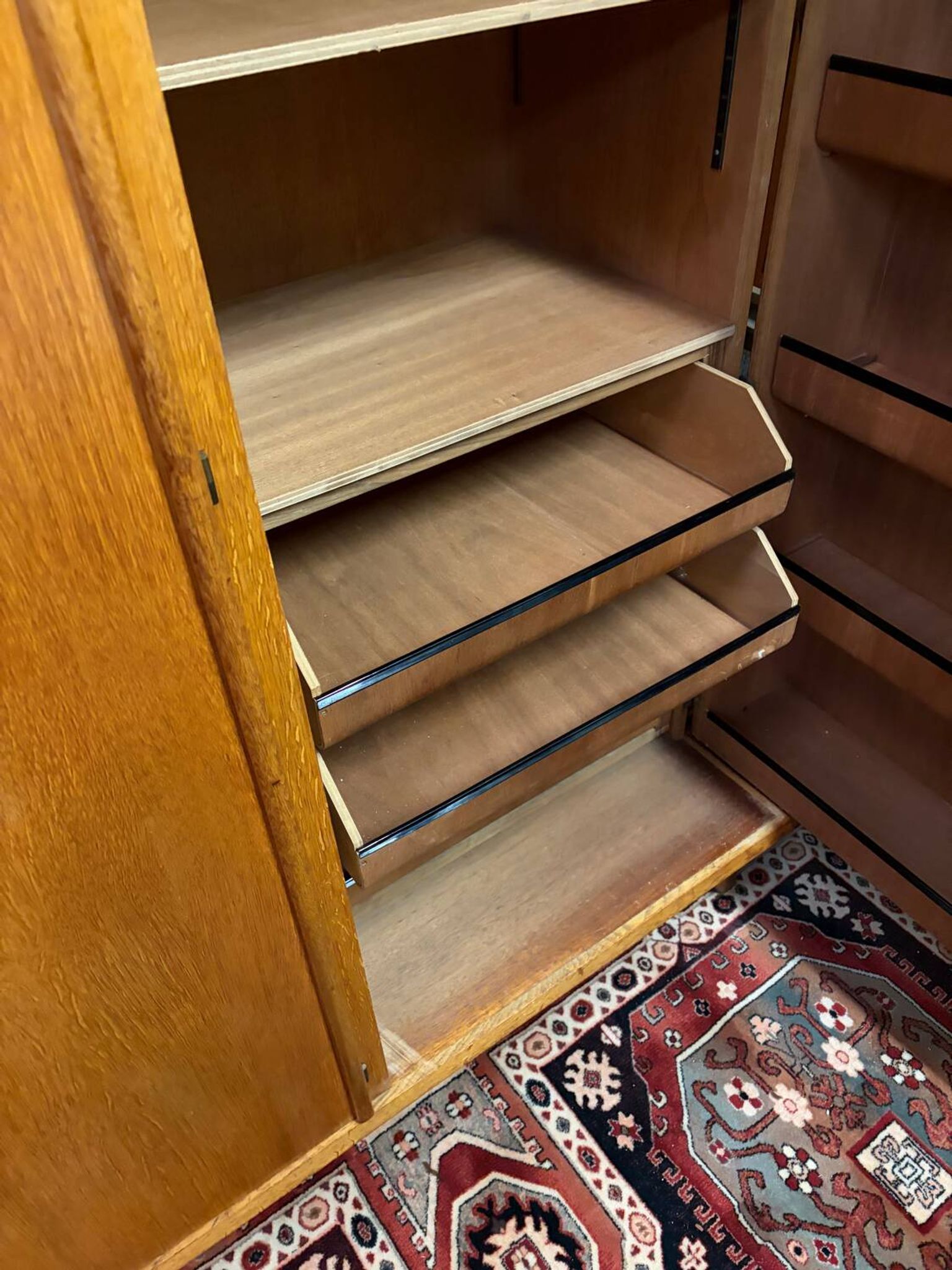 Vintage 60s/70s design wardrobe with compass feet.