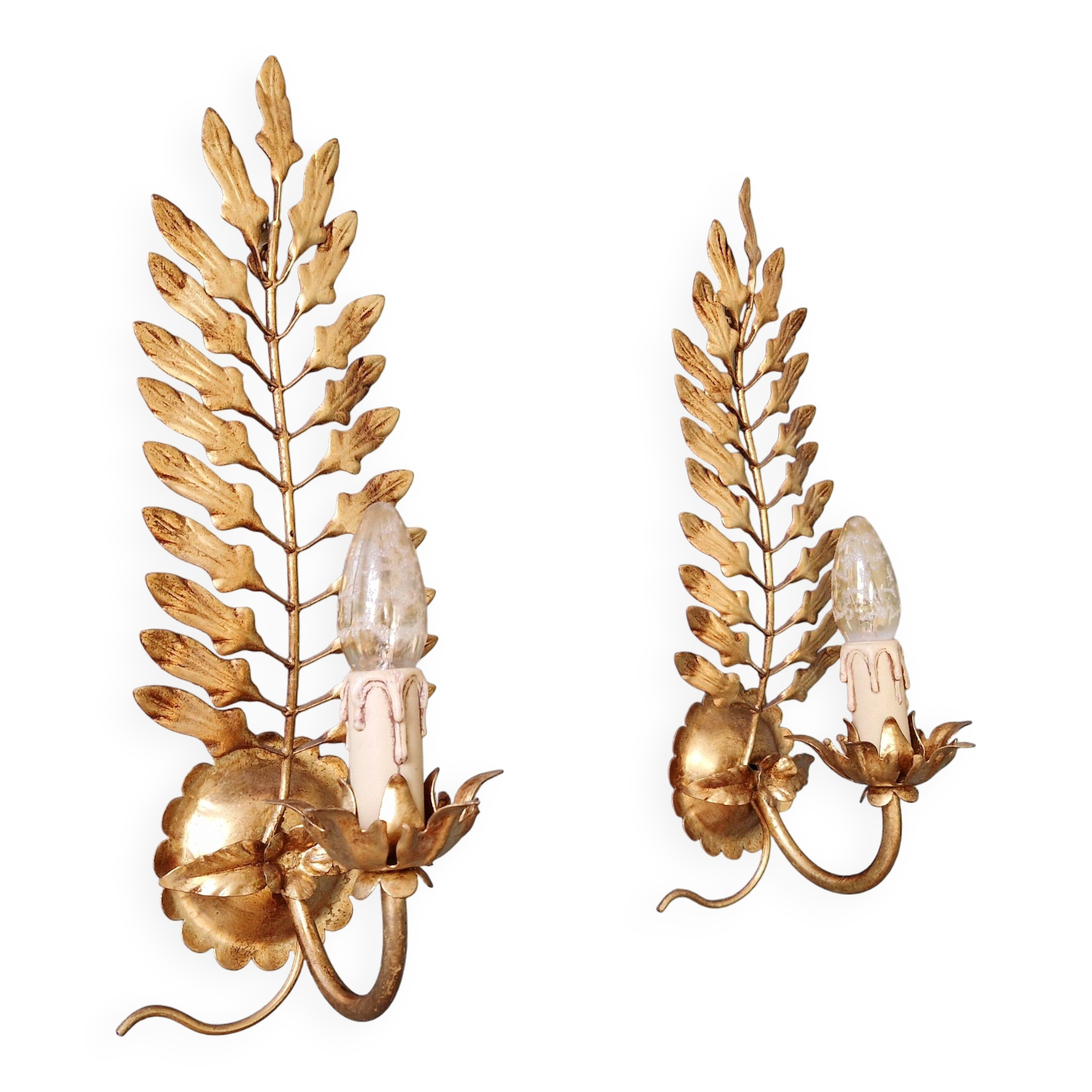 Pair of gold metal wall sconces in Hollywood Regency style, 1970s.