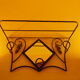 Wrought iron wall holder with top support and built-in mirror