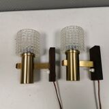 A set of Danish wall lamps, from the 1970s, in rosewood, aluminum and with pressed plastic shades