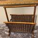 Wicker and brown wood magazine rack