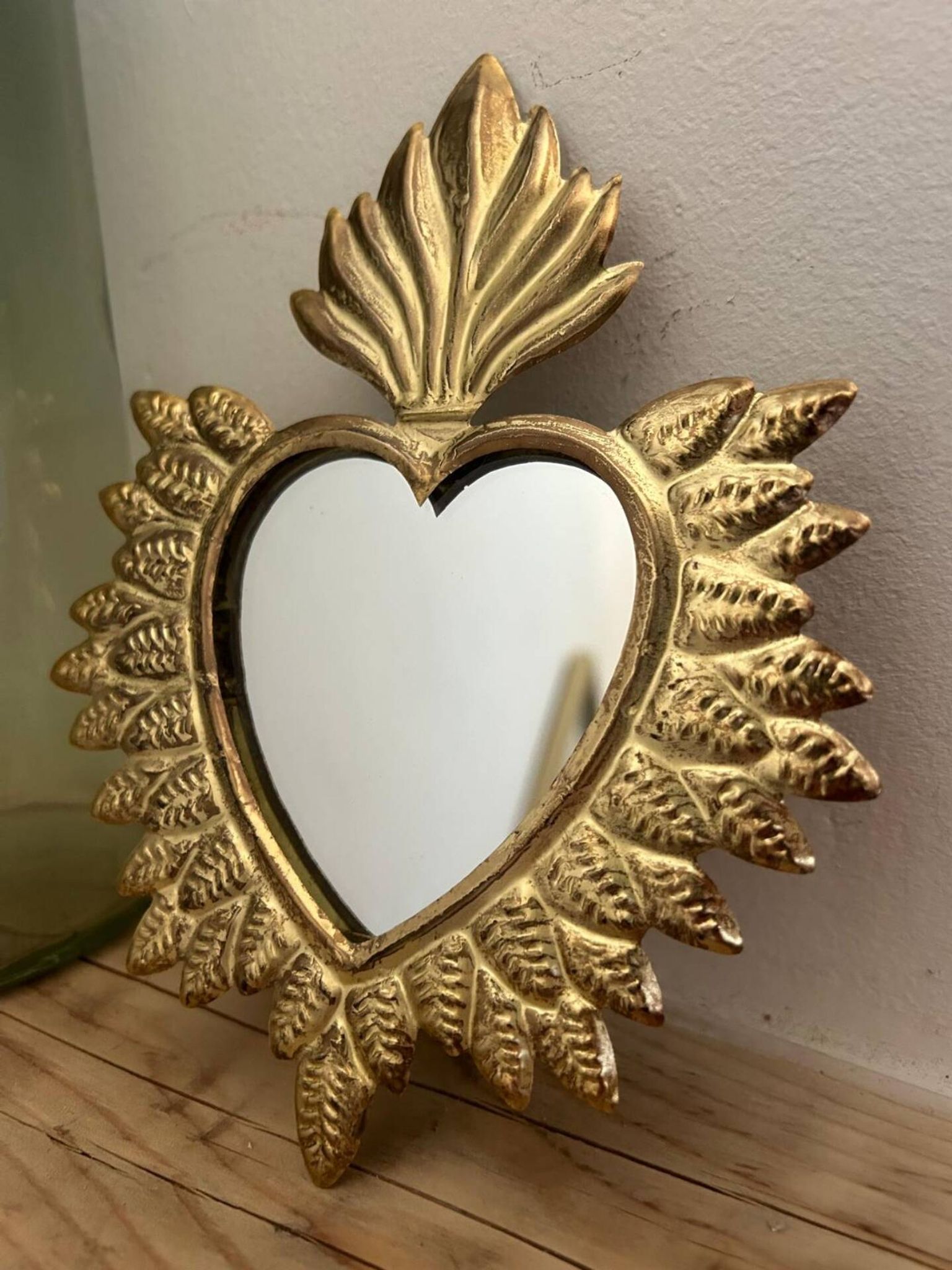 Golden ex-voto wall heart