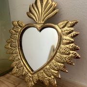 Golden ex-voto wall heart