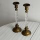 Pair of twisted metal and glass candlesticks