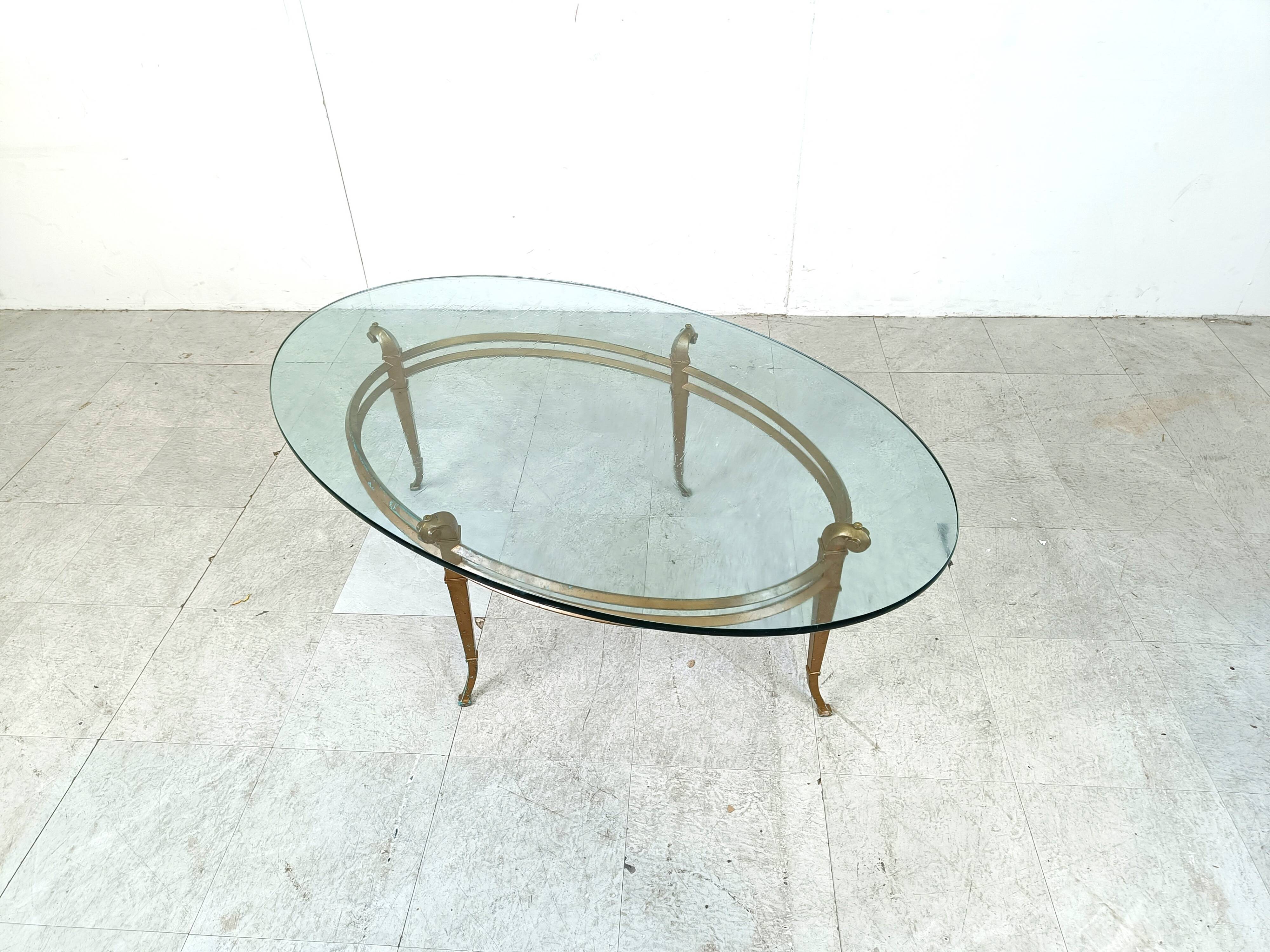 Vintage golden metal and oval glass coffee table, 1970s