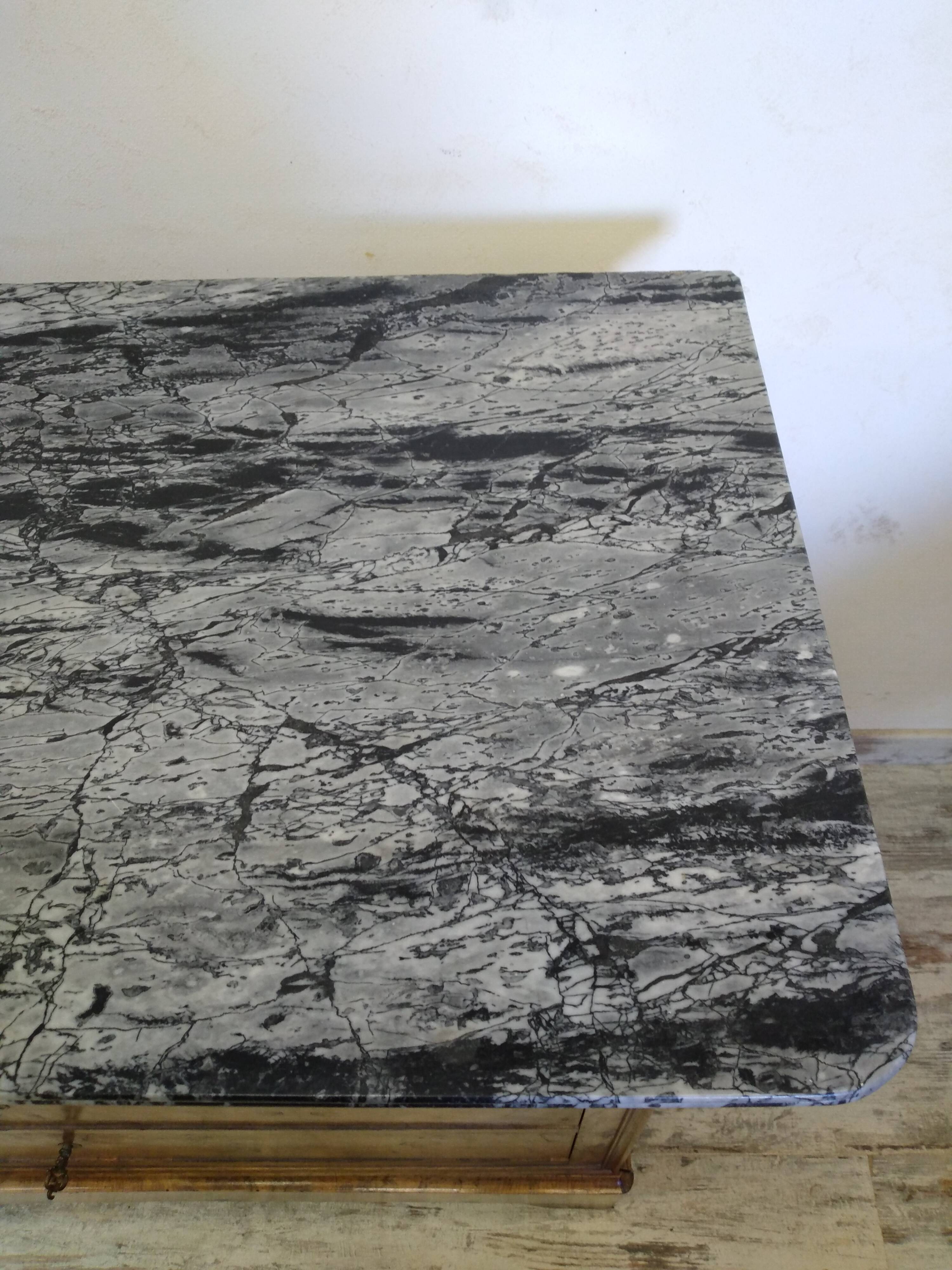 Chest of drawers with marble