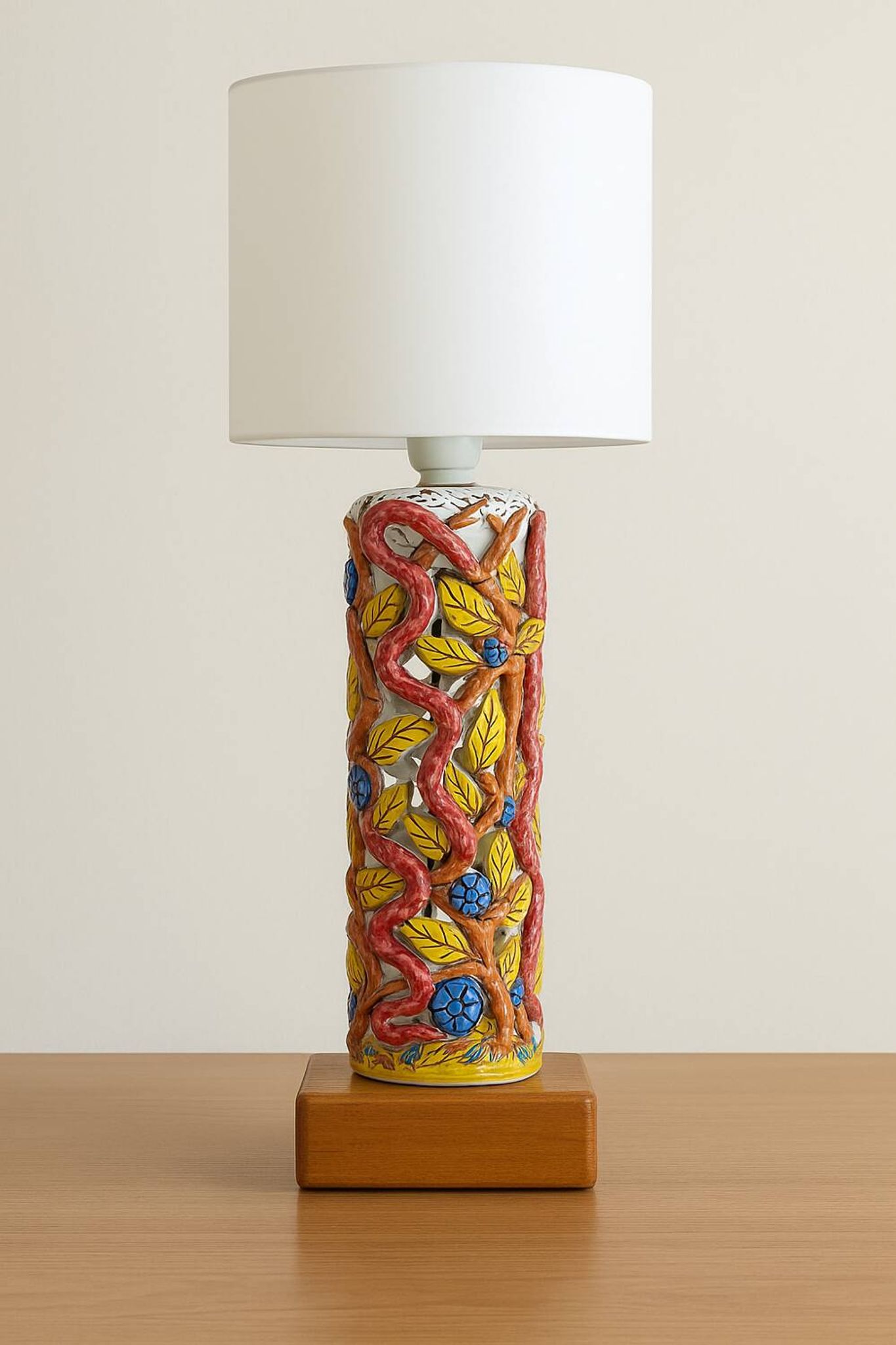 Openwork ceramic lamp base with Garden of Eden decor