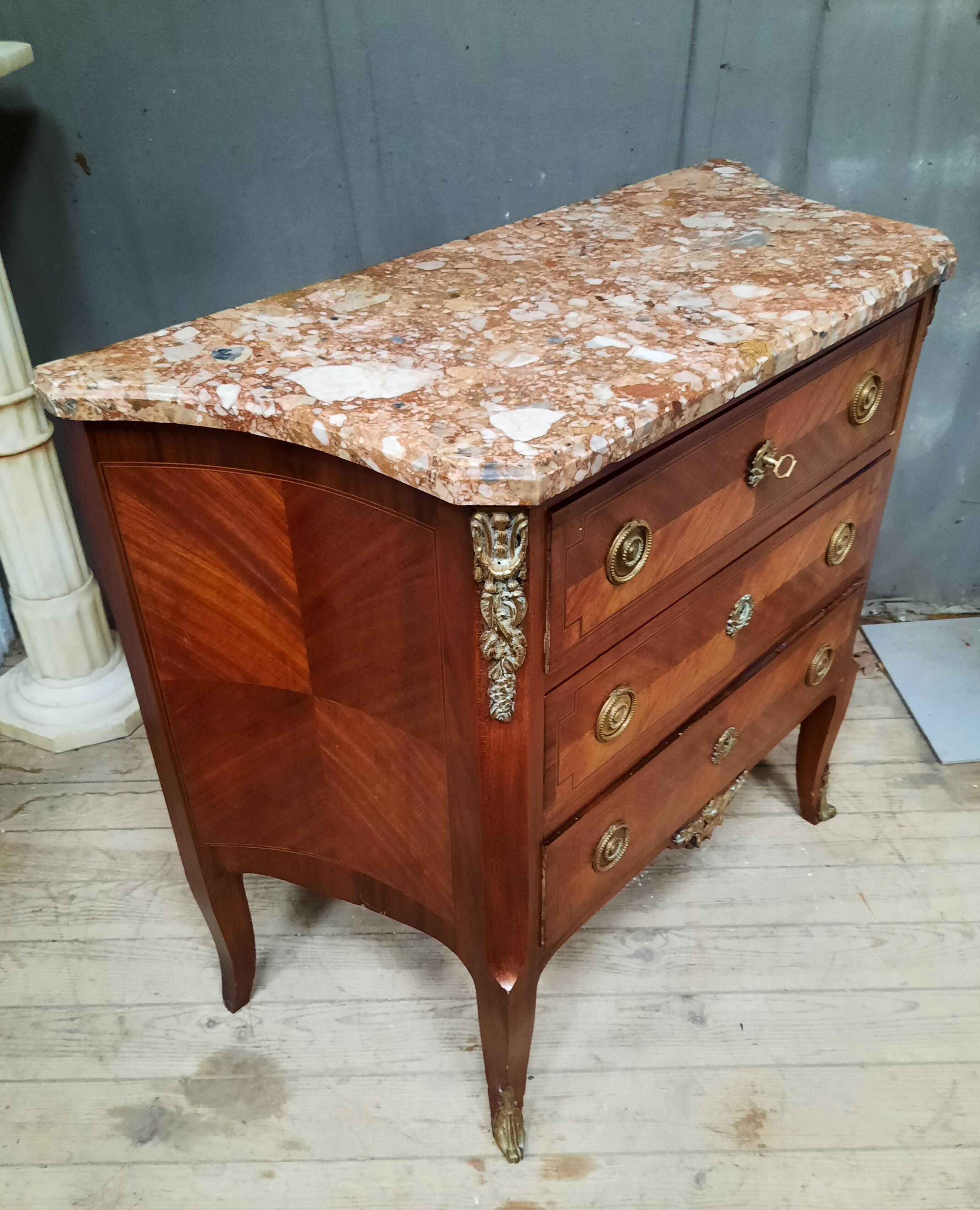 Transitional marquetry chest of drawers