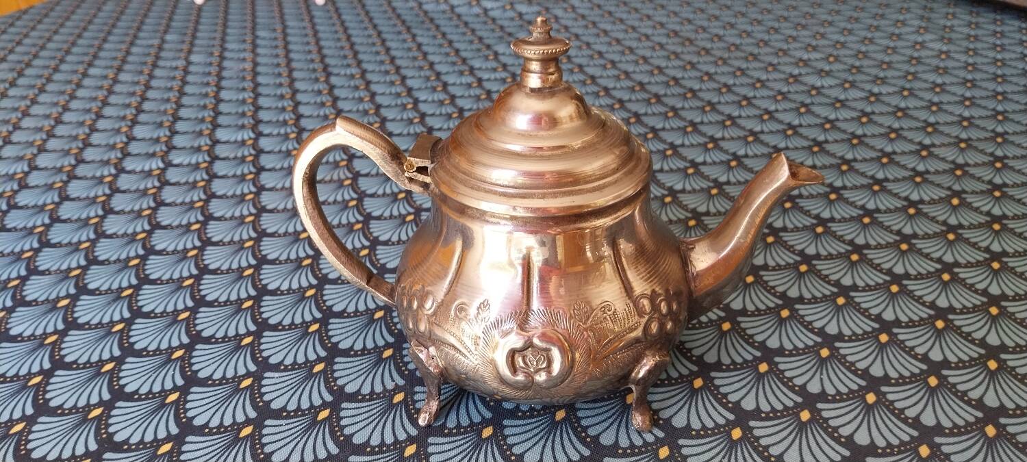 Silver-plated metal teapot with hallmarks