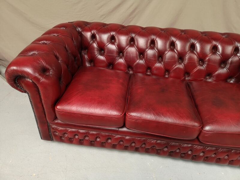 Red leather chesterfield sofa