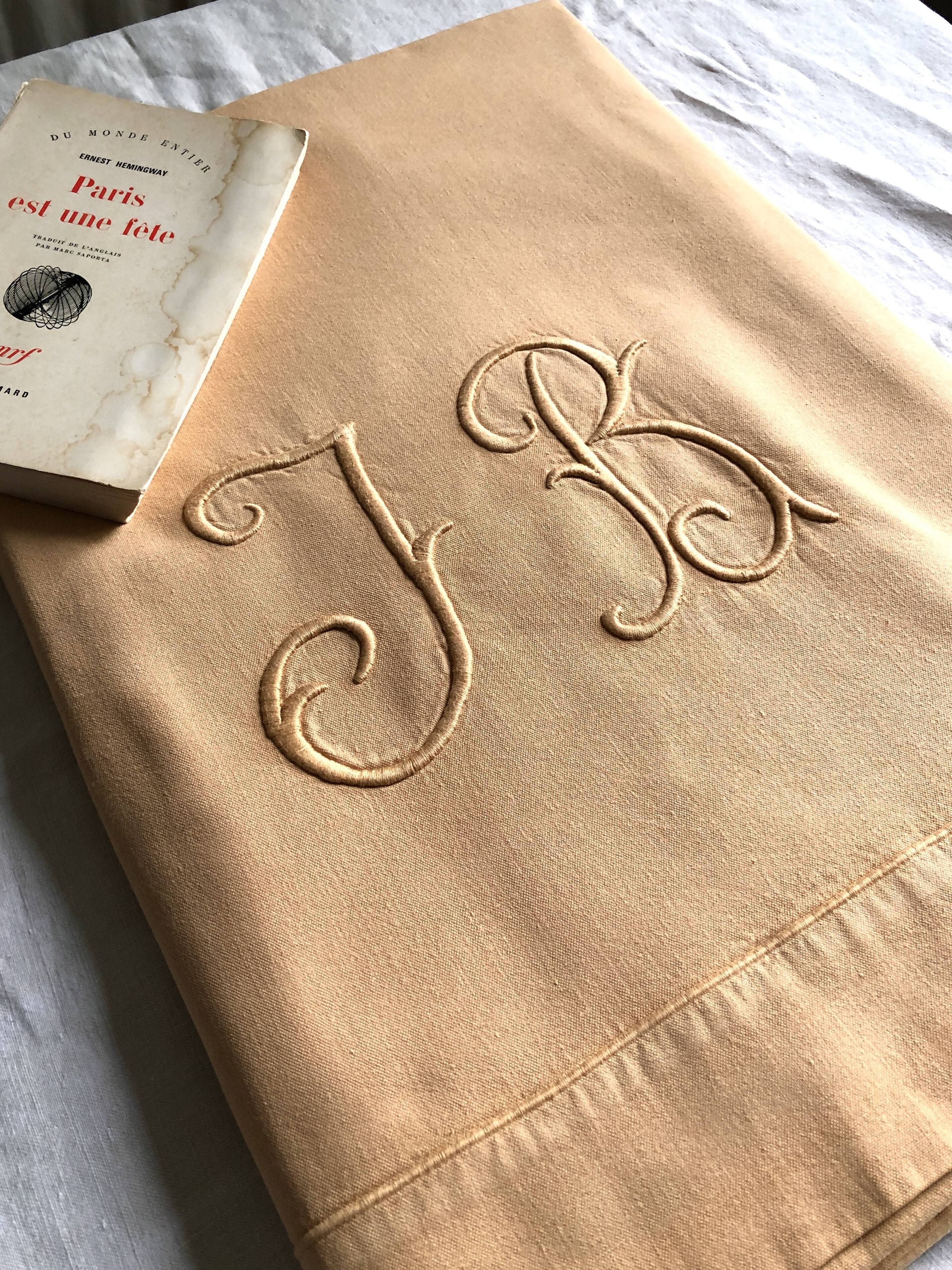 Old linen and yellow cotton sheet