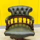 Chesterfield Revolving Captain's Chair with Green Leather Upholstery