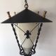 lantern in forged iron, opaline and brass