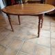 Beautiful oval wooden table with turned wooden leg with 3 extensions