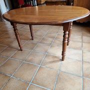 Beautiful oval wooden table with turned wooden leg with 3 extensions