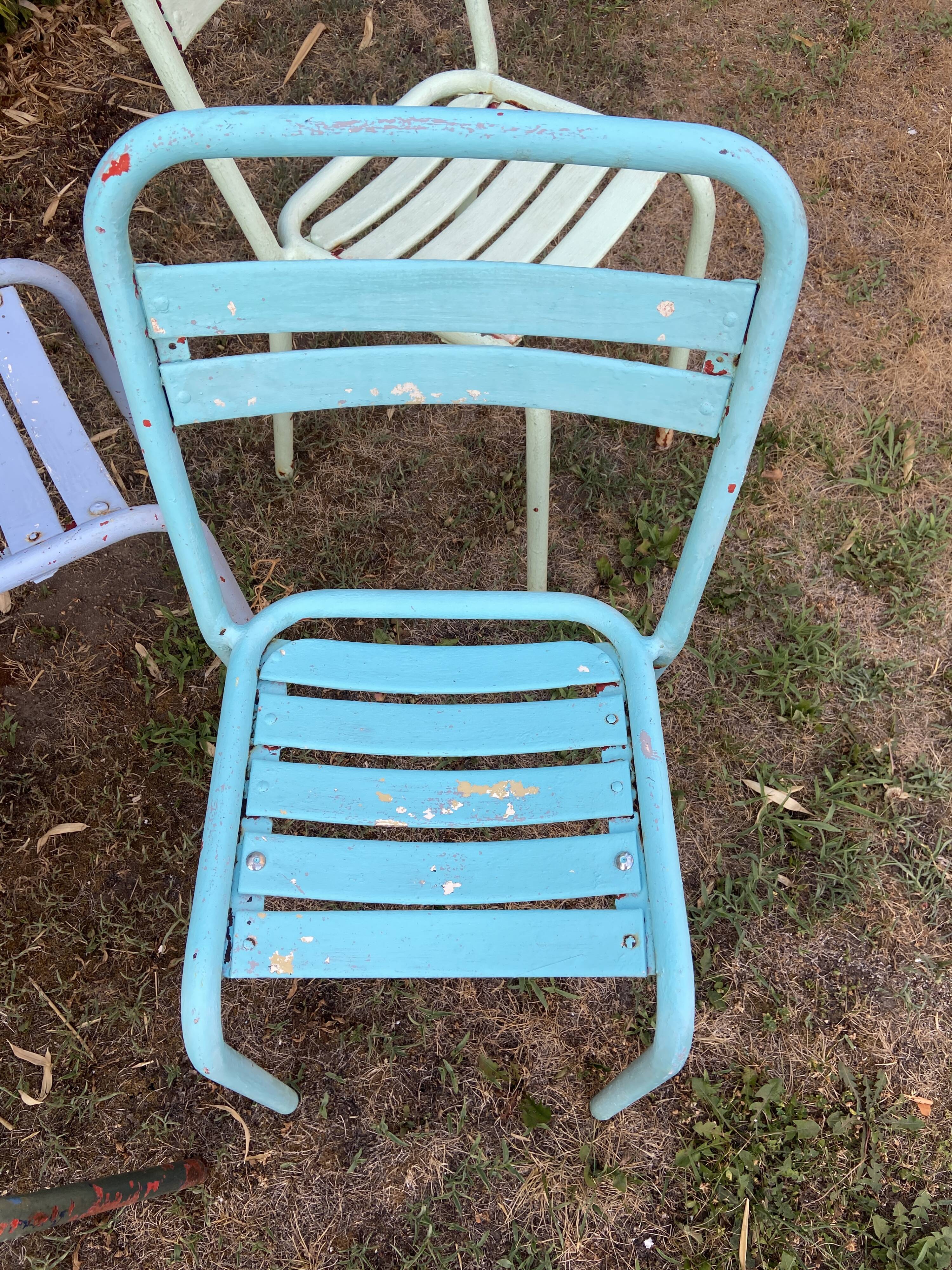 4 mismatched chairs Tolix brasserie bistro terrace French bistro 60s