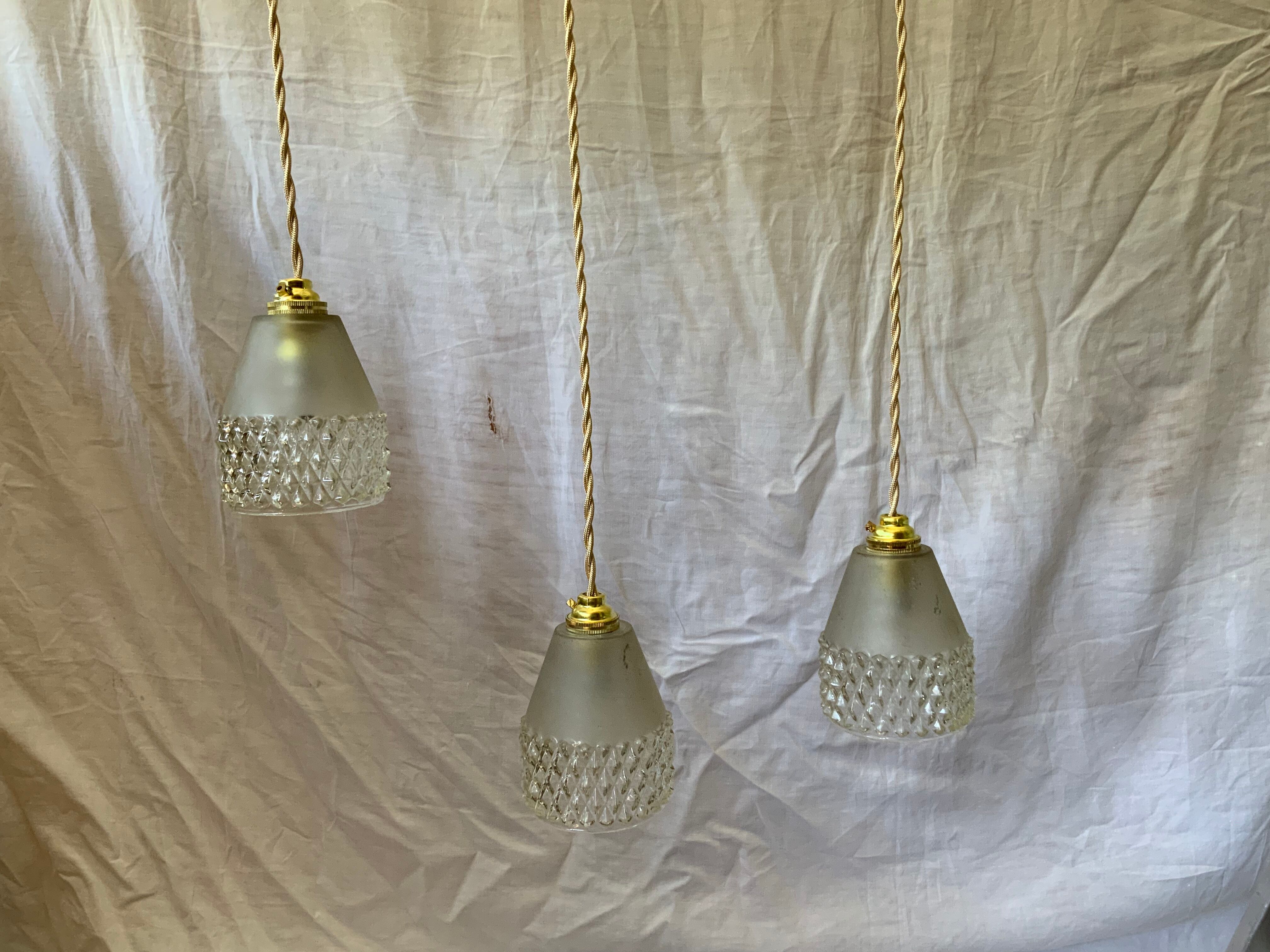 Trio of vintage suspensions