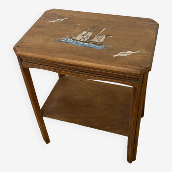 Small wooden side table with “boat, marine” decor