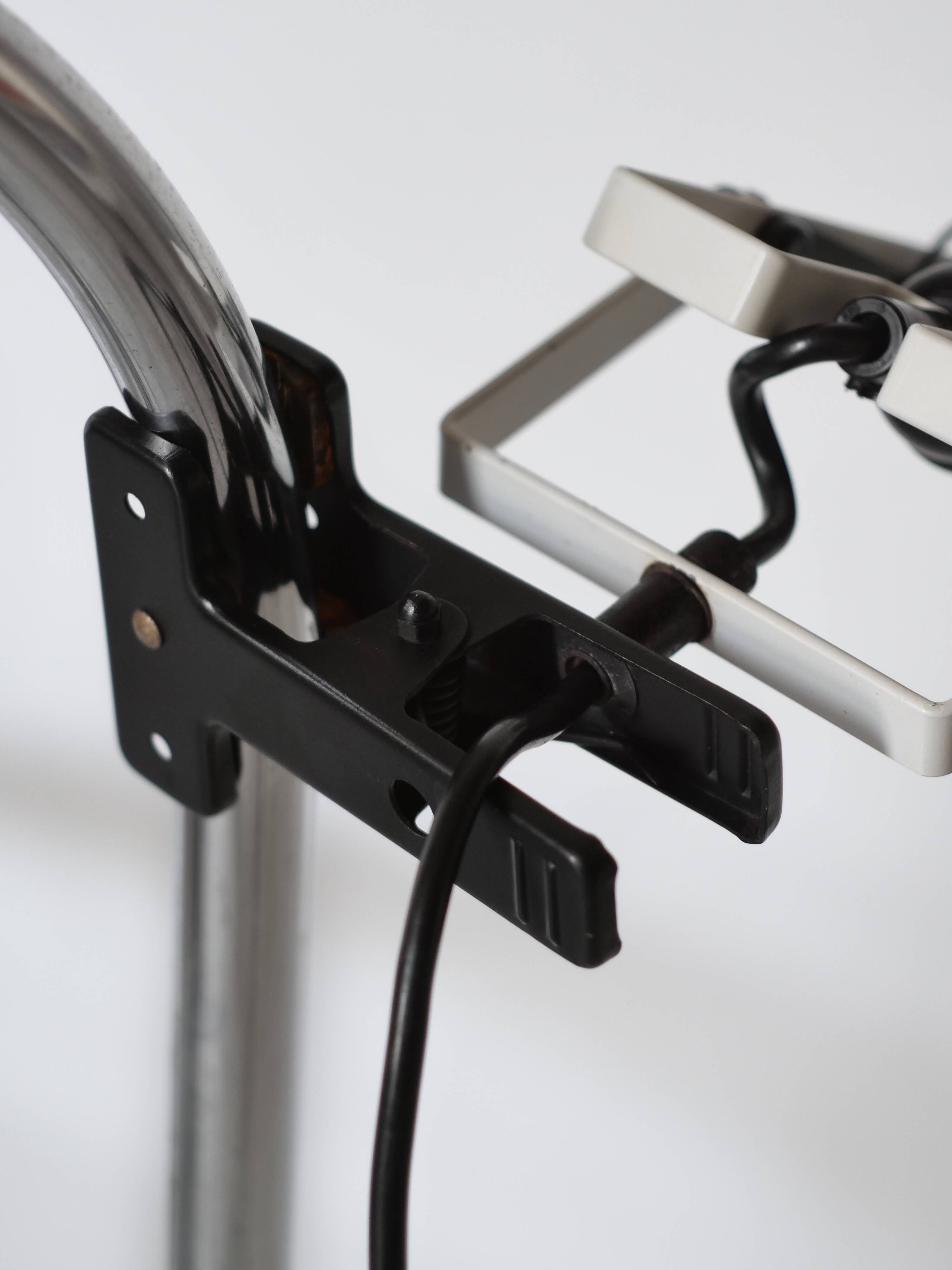 Artemide clamp lamp designed by Ernesto Gismondi model Sintesi