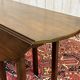 Drop-leaf English table in mahogany called Gateleg.