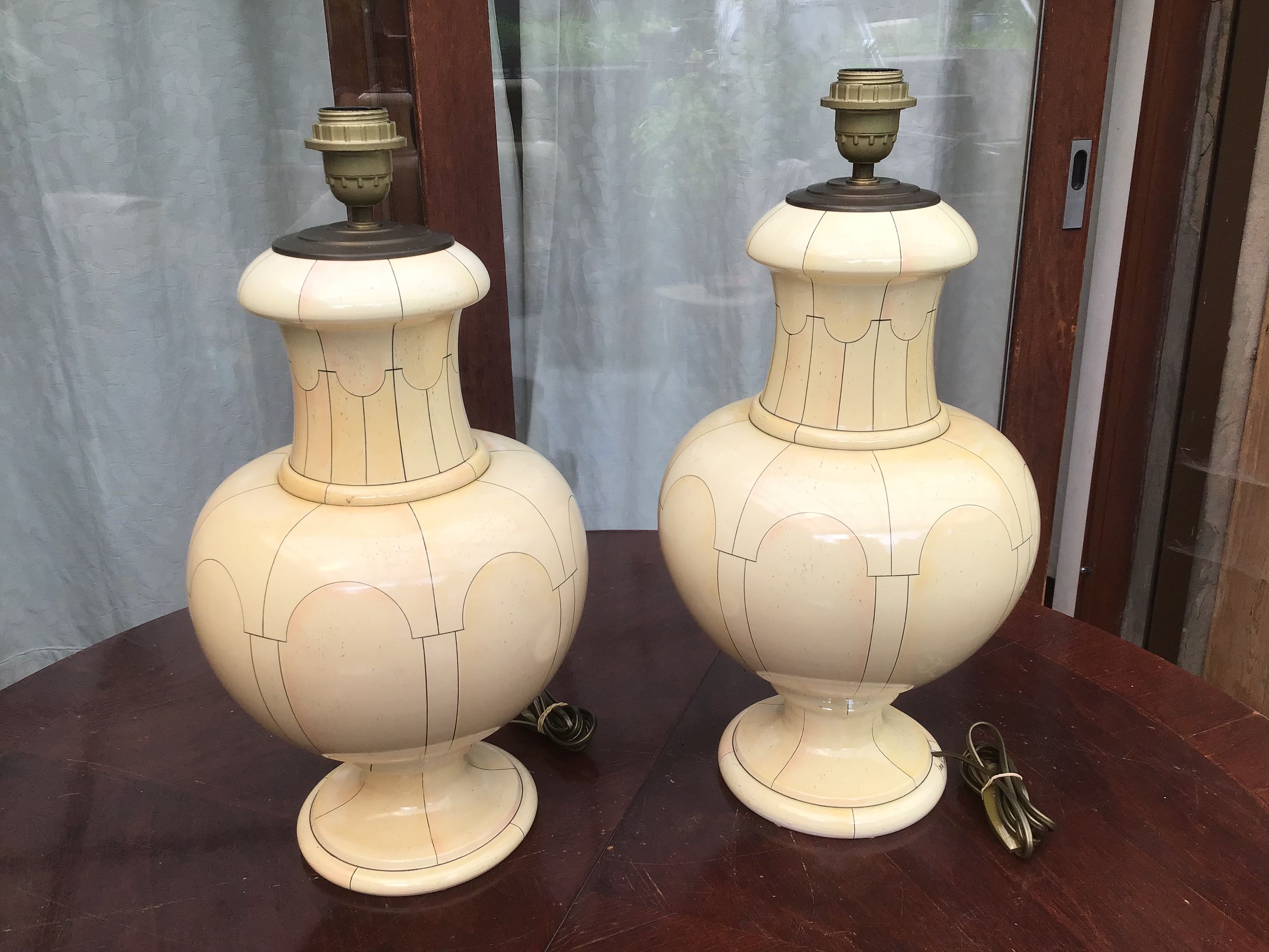 Jean Roger in Paris. Pair of ceramic baluster lamps decorated with arches and ivory imitation