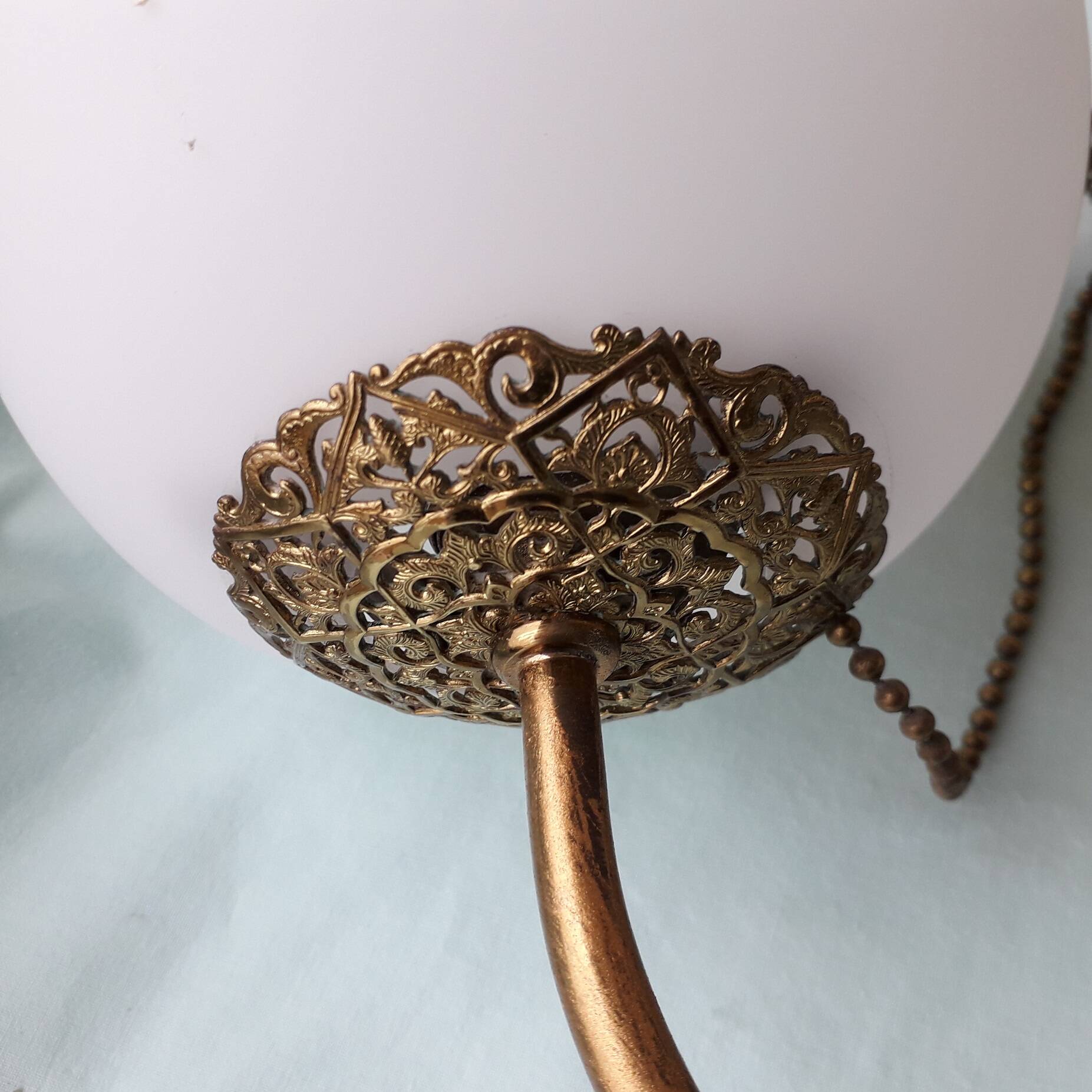 Pair of metal and opaline wall lights