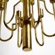 Three staged 18 arm Mid Century brass chandelier with a long brass rod