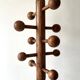 Modernist coat rack on a stand and rotating in solid pine, The Arcs 1970.
