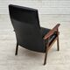 1970s, Danish armchair, black artificial leather, teak wood.