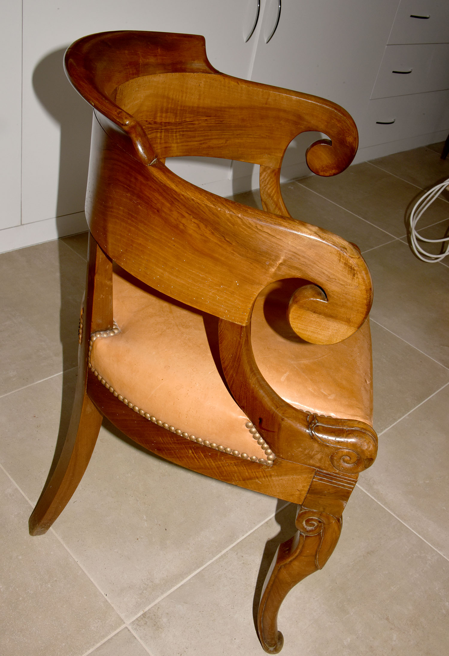 Old leather office chair And solid wood
