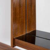 Mirror and its console in mahogany. 1970s.
