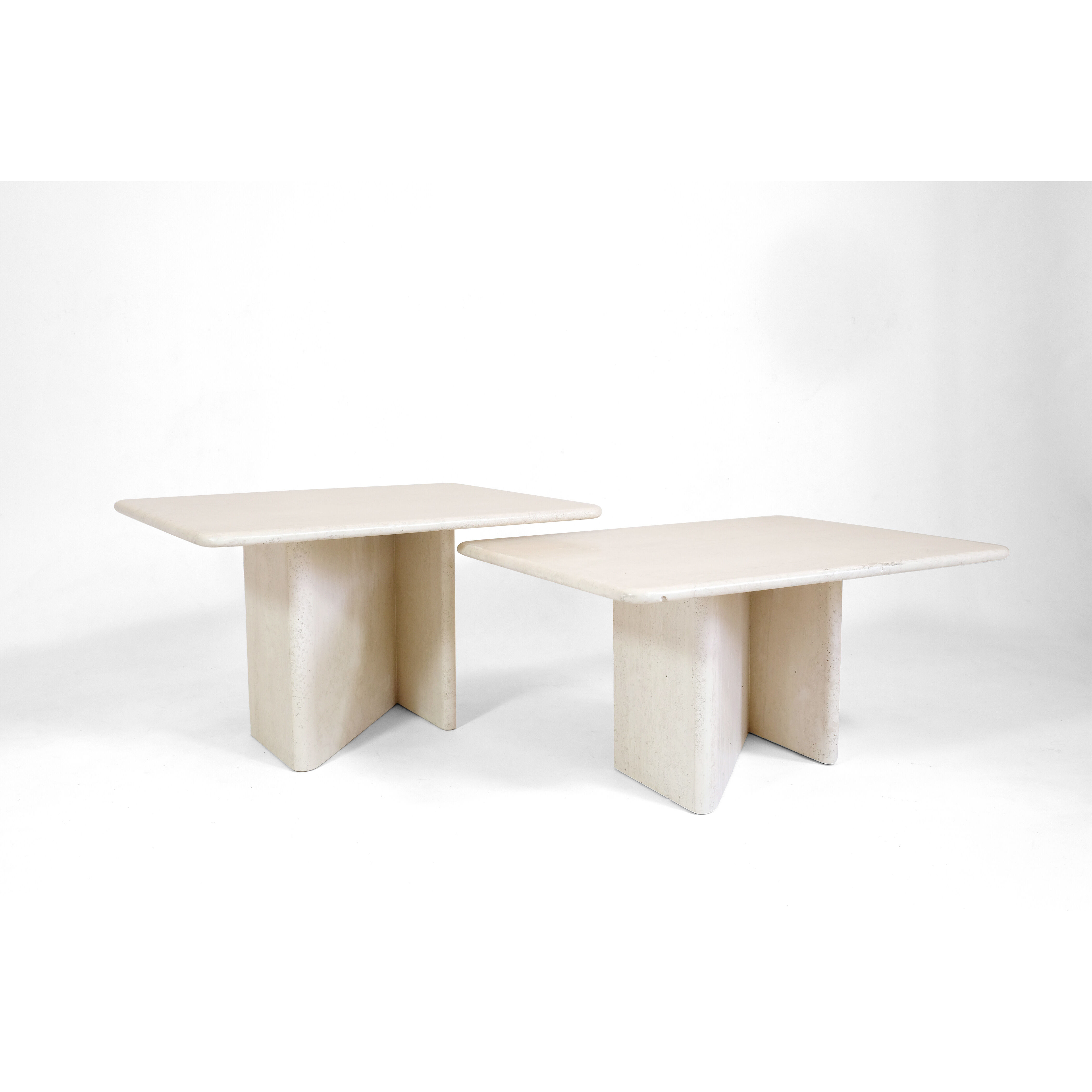 Pair of travertine trundle tables, Italy
