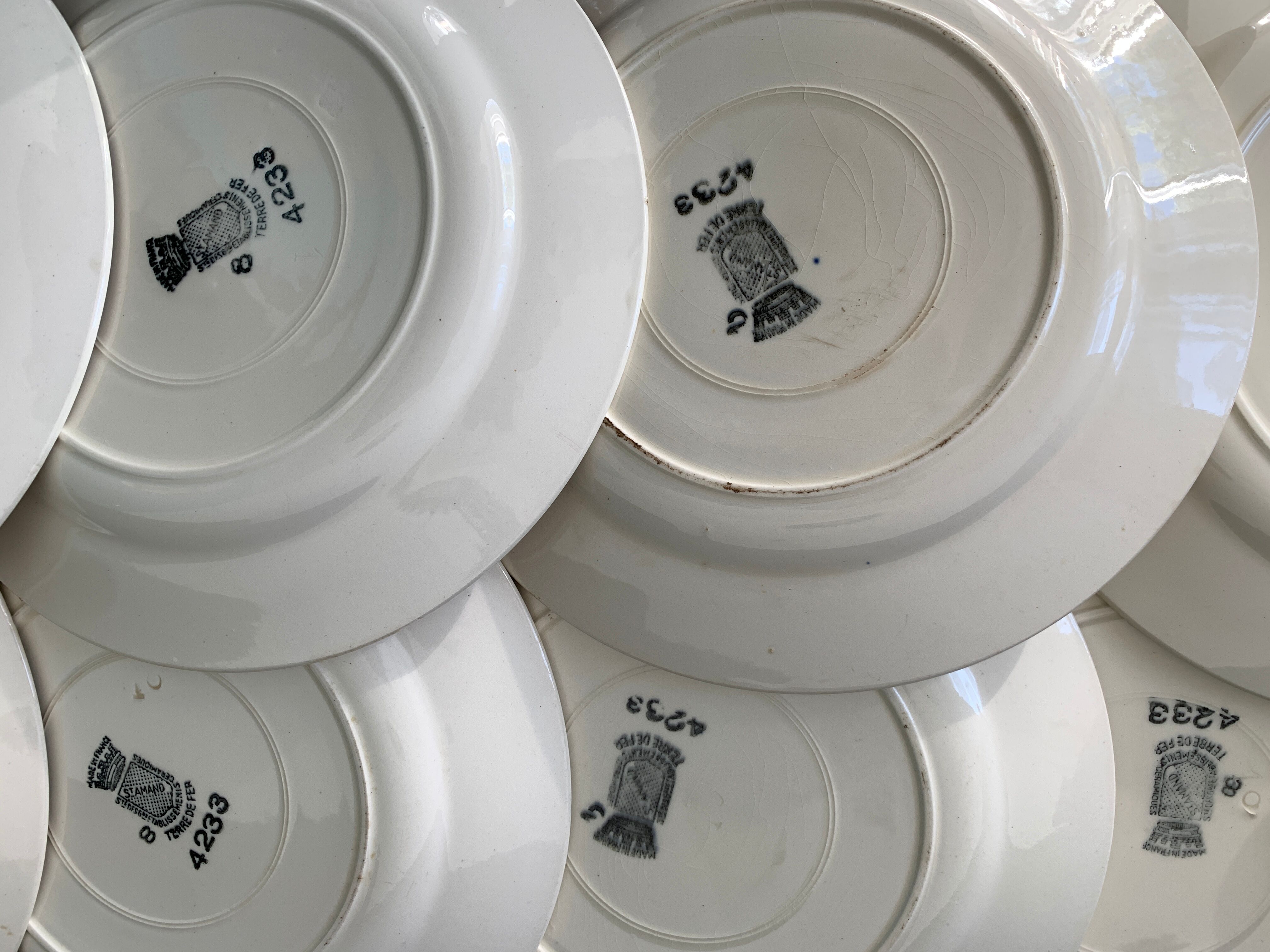 11 dessert plates Saint Amand Terre de Fer, 1930