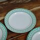 Set of 4 KIFO L'Amandinoise flat plates with green leaf design.