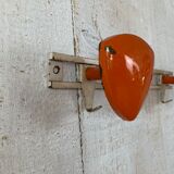 Vintage orange metal patère