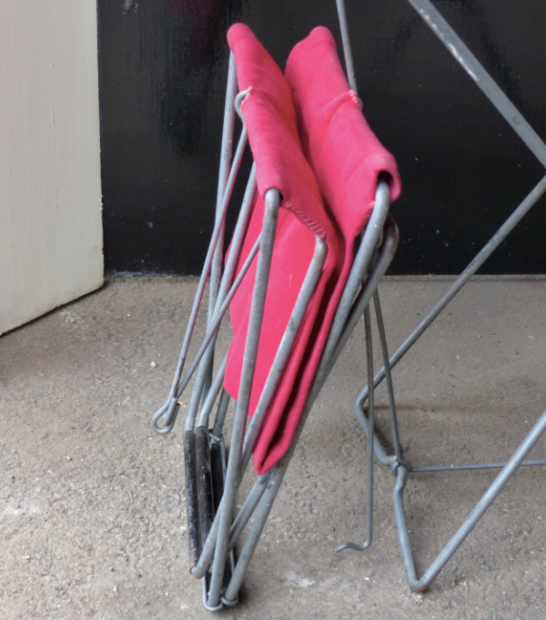 Pair of folding stools in red canvas and metal