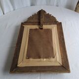 Mirror with parecloses