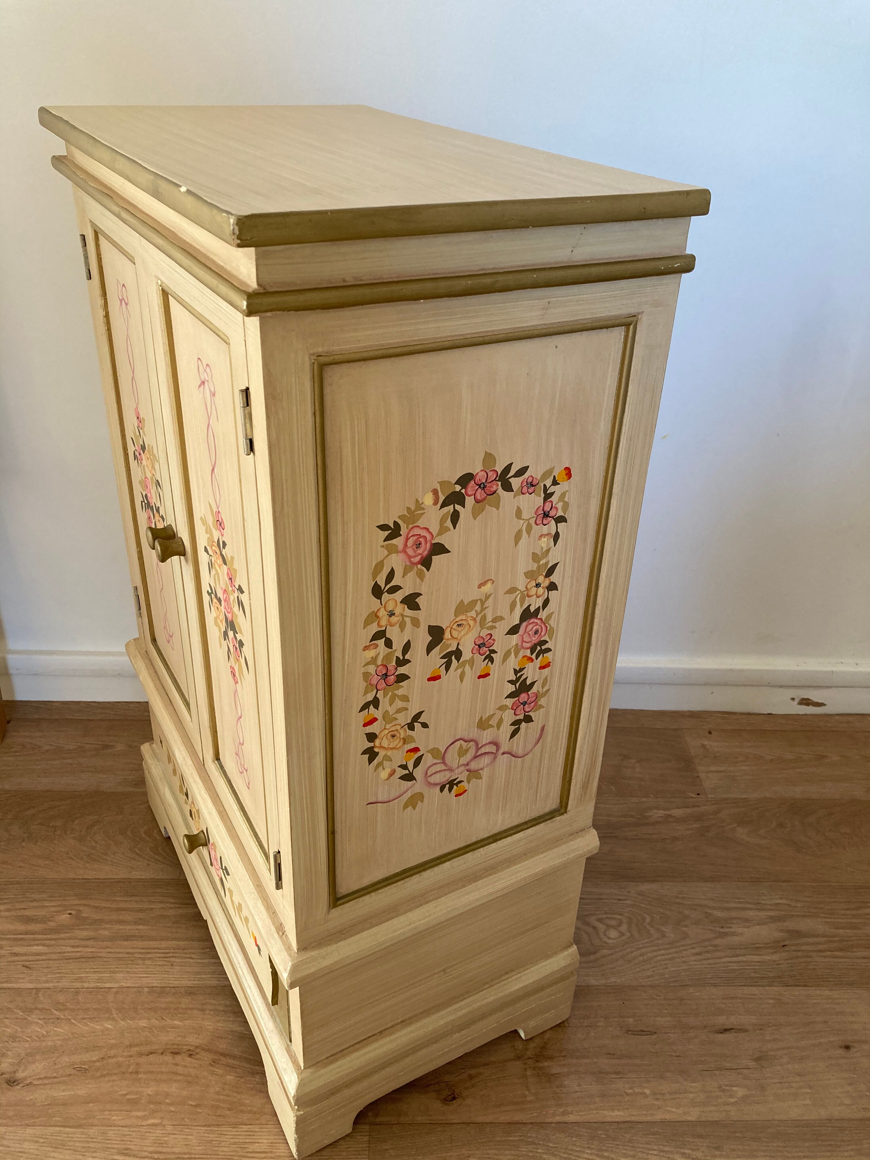 2-door flowered wooden cabinet